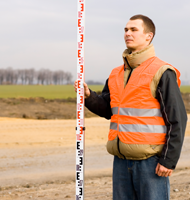 Land Surveyor with Level Rod