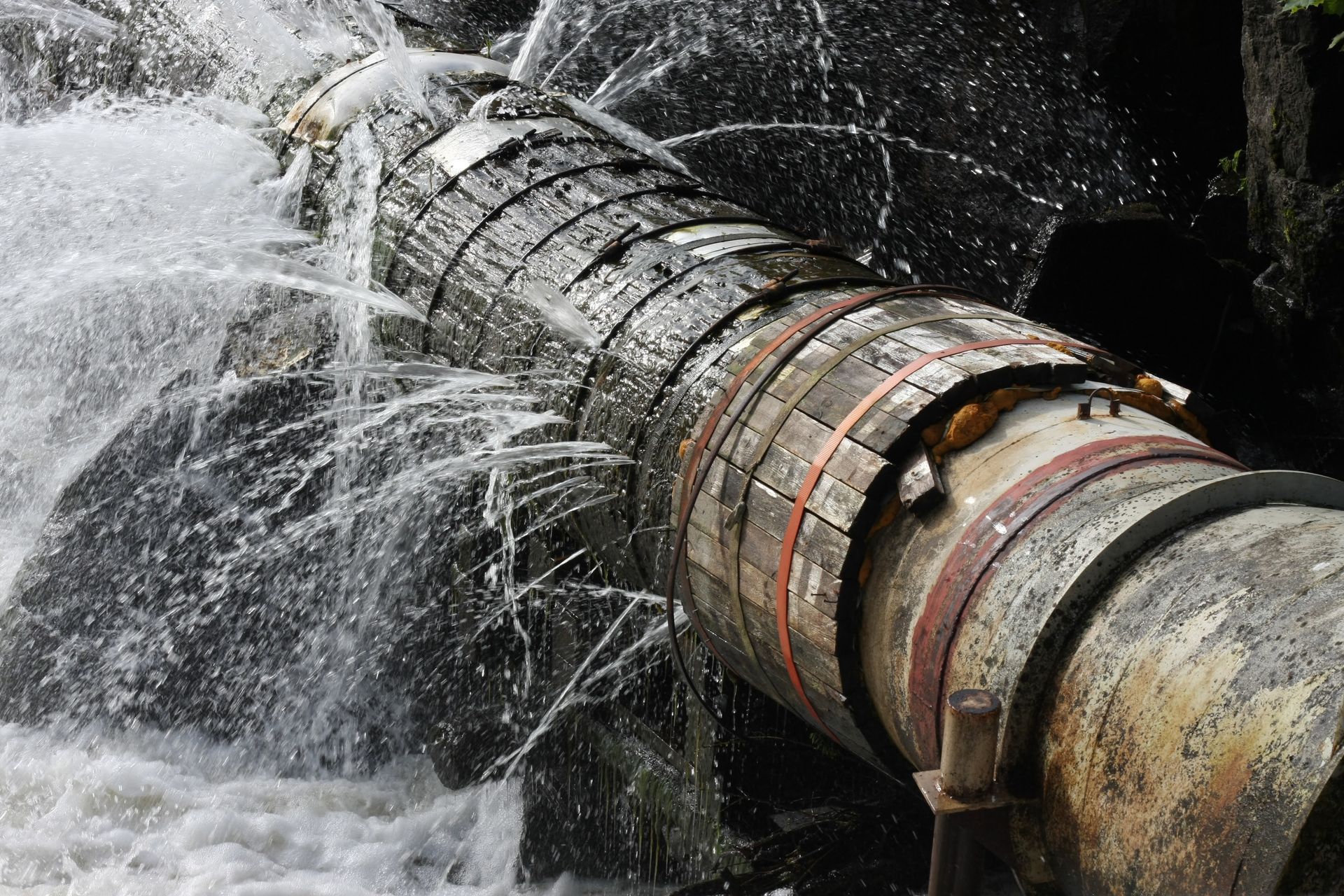 A pipe is bursting and water is coming out of it - Springville, UT - Blue Plumbing