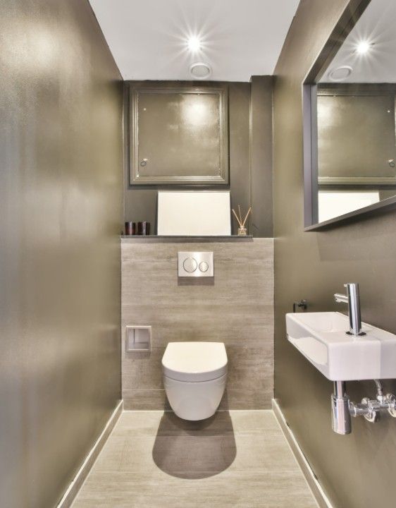 Derbyshire Specialists Group cloakroom conversion to a toilet room with sink in Derbyshire