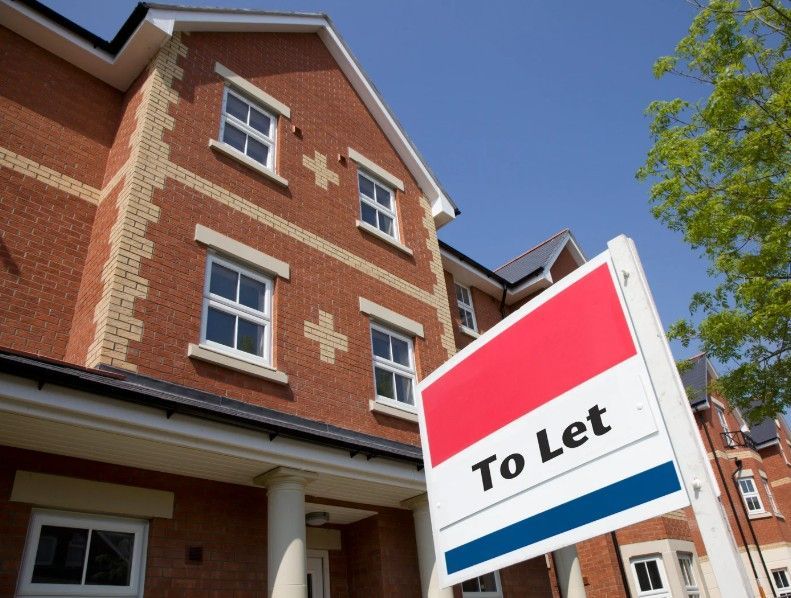 Derbyshire Specialists Group showing a property to to prospective  tenants in Derby
