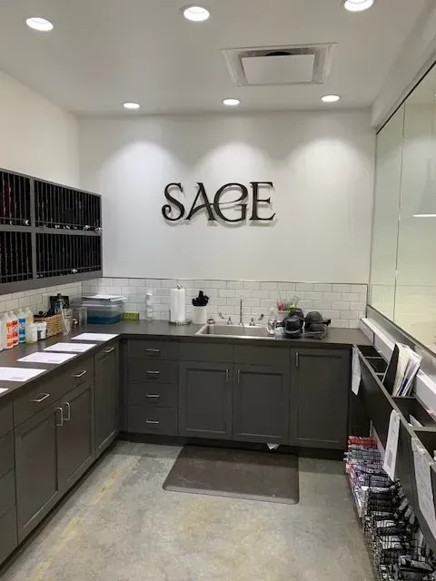 Interior view of a work space with cabinetry, sink, and 