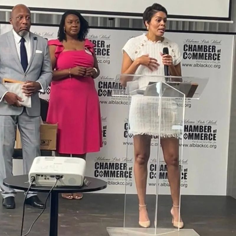Brittaney Jenkins speaking at the Alabama State Black Chamber of Commerce conference