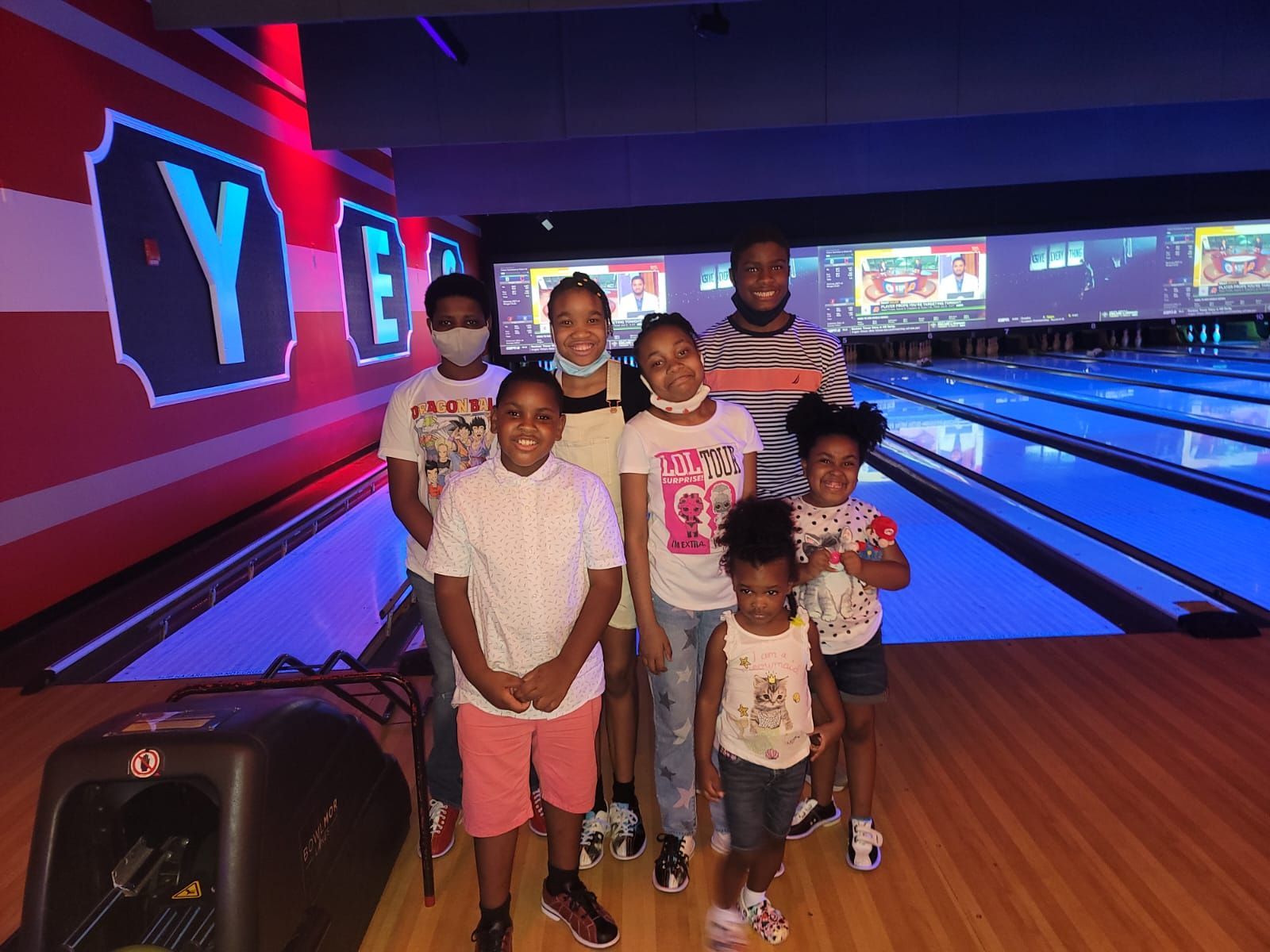 Some kid church members at a Bowling Center