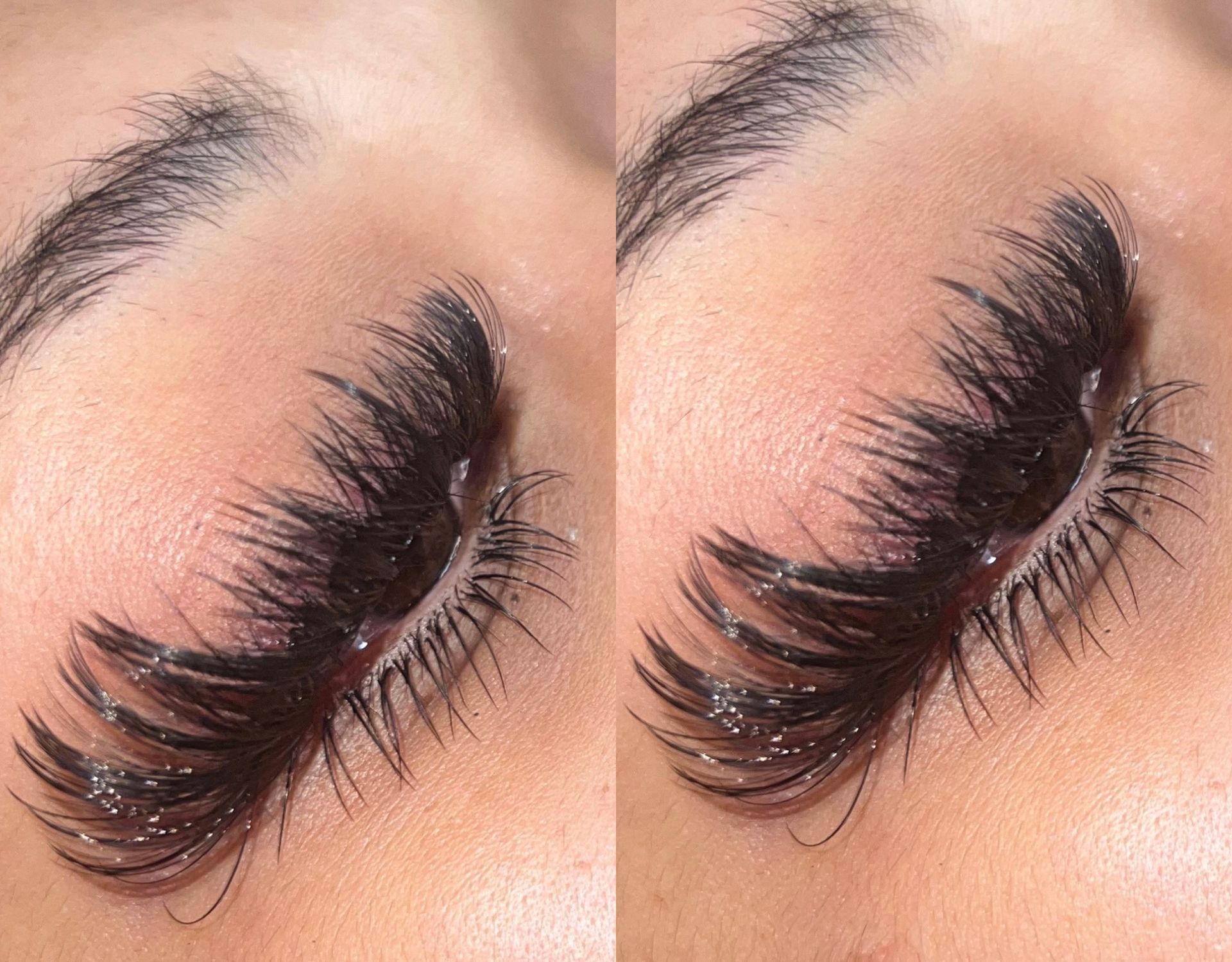 A close up of a woman 's eye with long eyelashes.