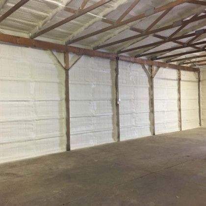 A large warehouse with a lot of foam on the walls and ceiling.