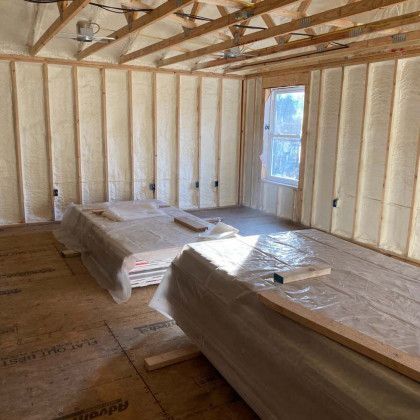 A room with a lot of insulation on the walls and ceiling.