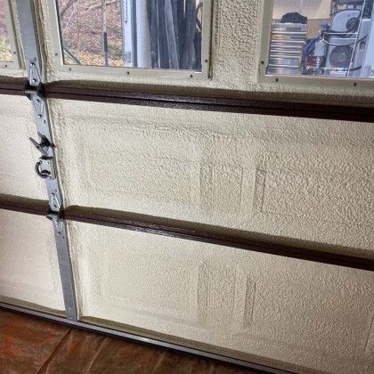 A garage door with a lot of foam on it.