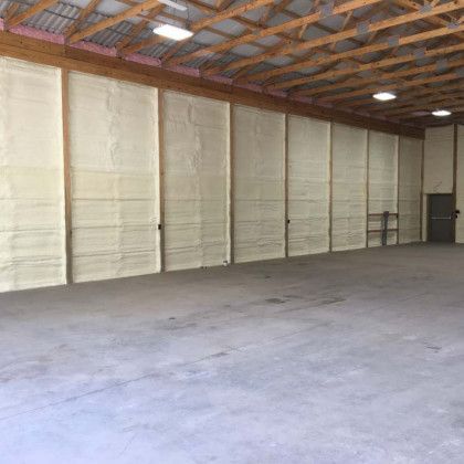 A large warehouse with a lot of foam on the walls and ceiling.