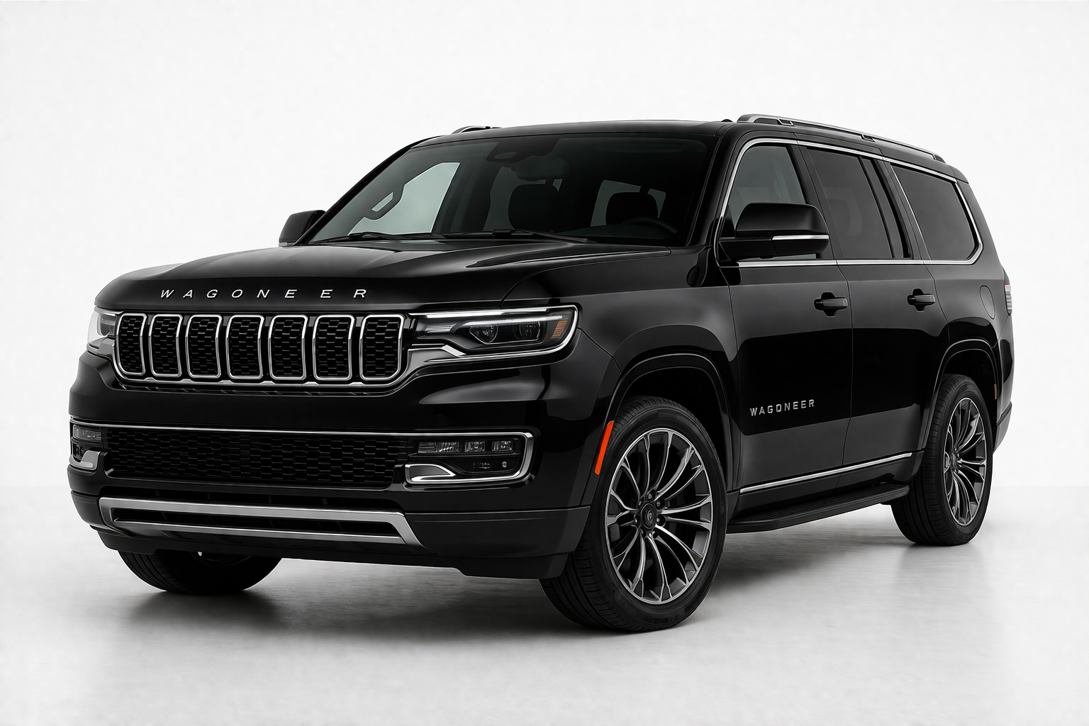 A black Jeep Wagoneer L SUV viewed from the front three-quarter angle against a plain white studio background.