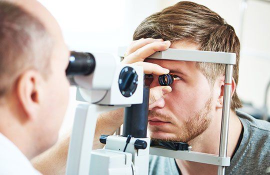 Opthamologist Examining the Patient - Eye Exams in Gallup, NM