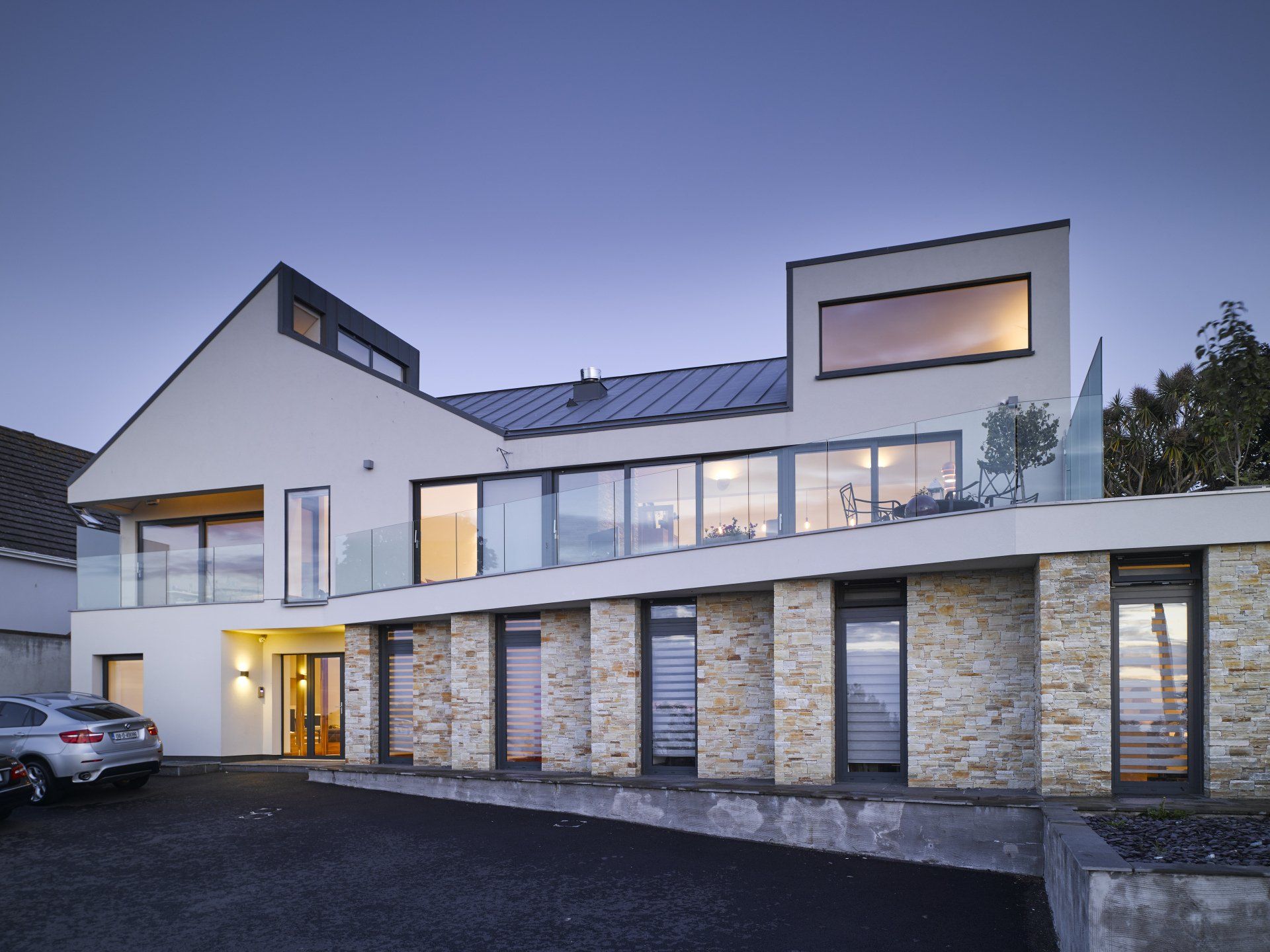 Stone detailing at a sustainable dwelling overlooking Howth harbour