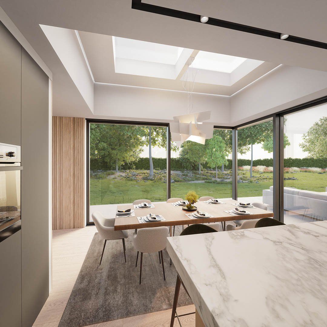 Large sliding doors and glass walls enhance the sense of connection between the nature that surrounds the house