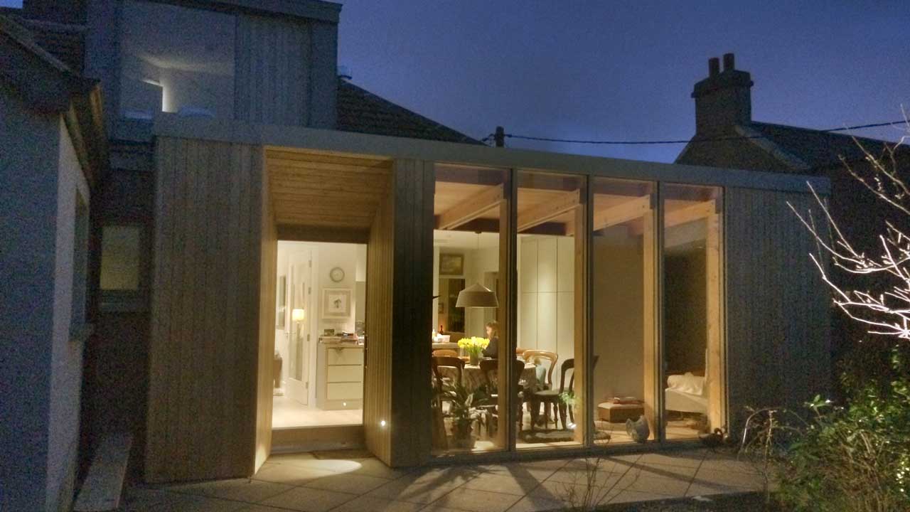 View of the dinning room from the outside. Project designed by Dublin Design Studio