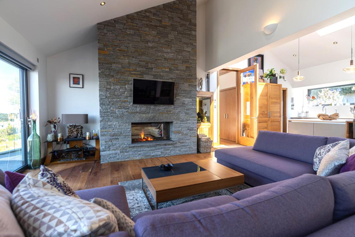 Intimate family room with a log burning stove