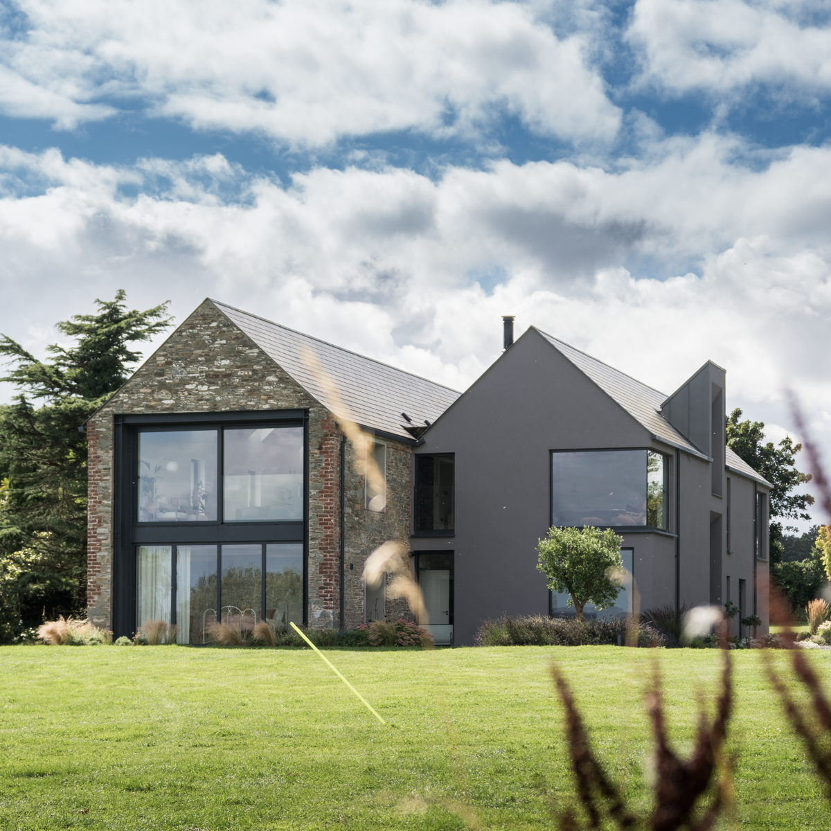 Redevelopment and extension of a 19th century barn as a new contemporary family home  located in Mountain View, County Louth