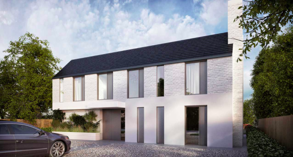 A newly built house with a striking white brick facade, embodying modern architectural style.