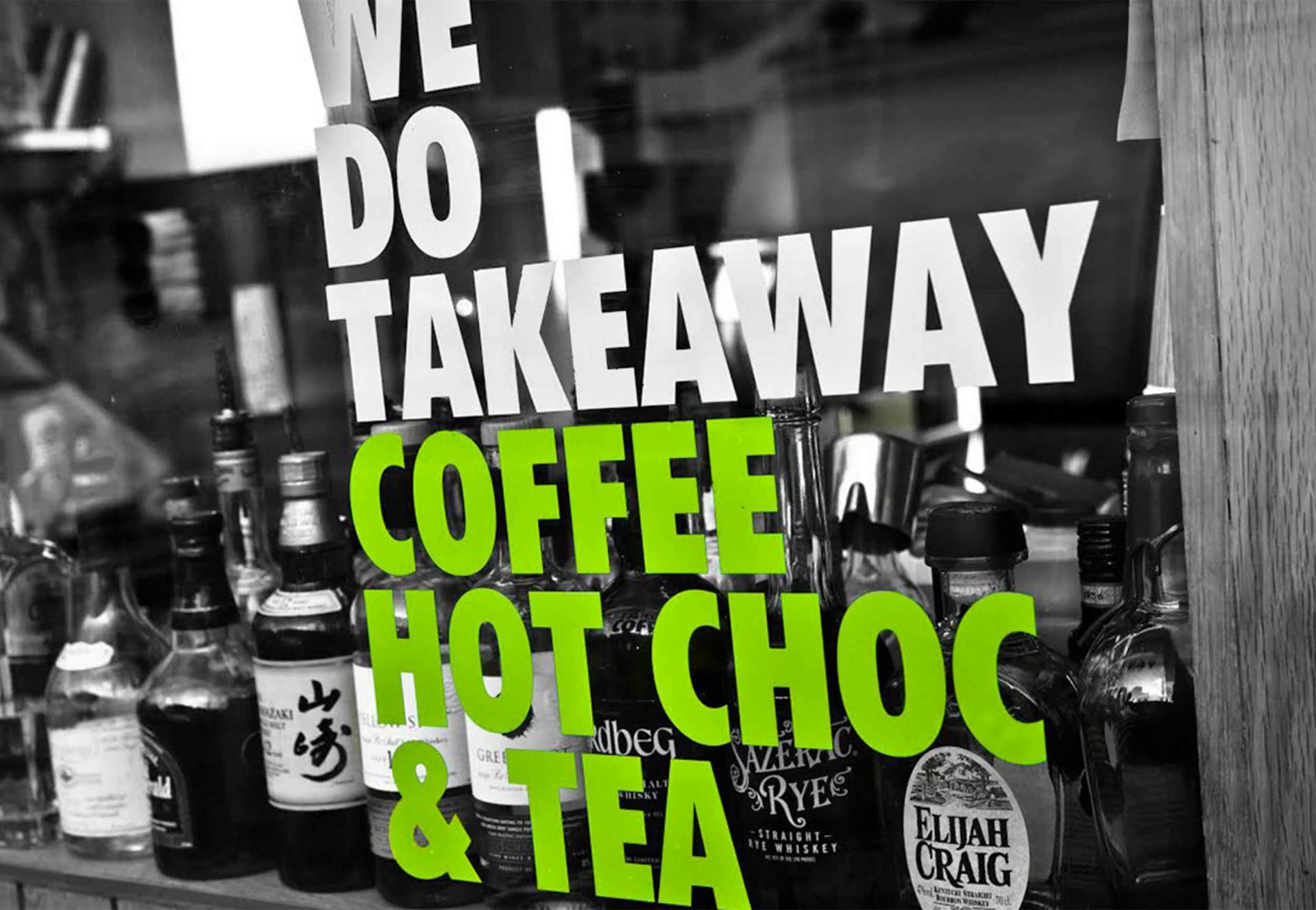 Green 19 restaurant front window that says 'we do takeaways coffee hot choc & tea' designed by 'Dublin Design Studio'