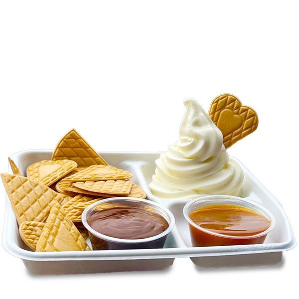 Vanilla soft serve ice cream with waffle cone chips, served with fudge and caramel sauce.