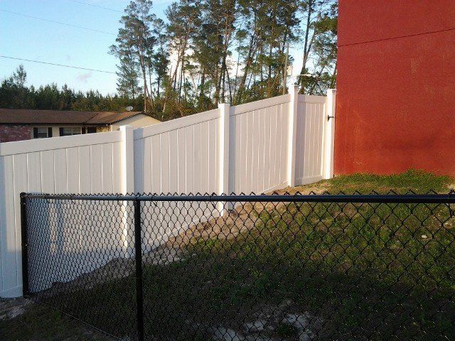 black fence connected -  Fencing Services in New Port Richey, Florida