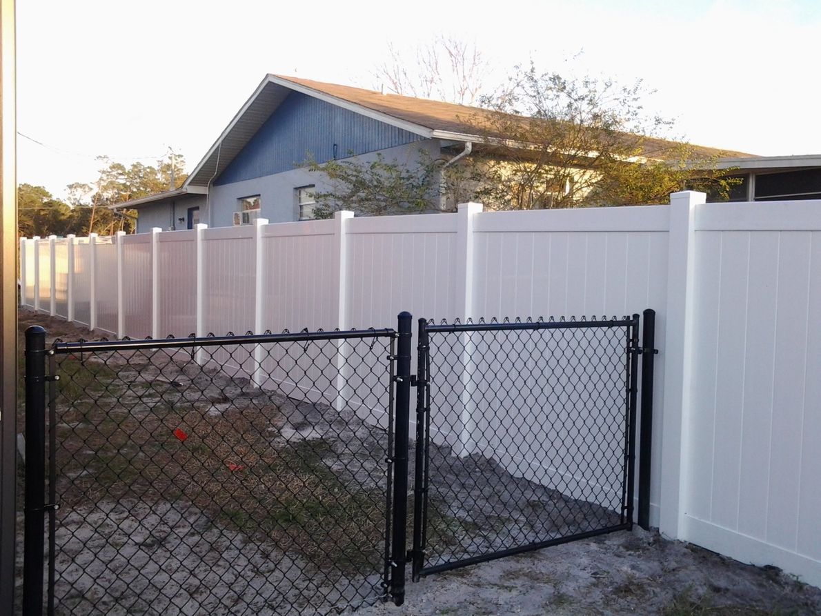 Two fences connected  Fencing Services in New Port Richey, Florida