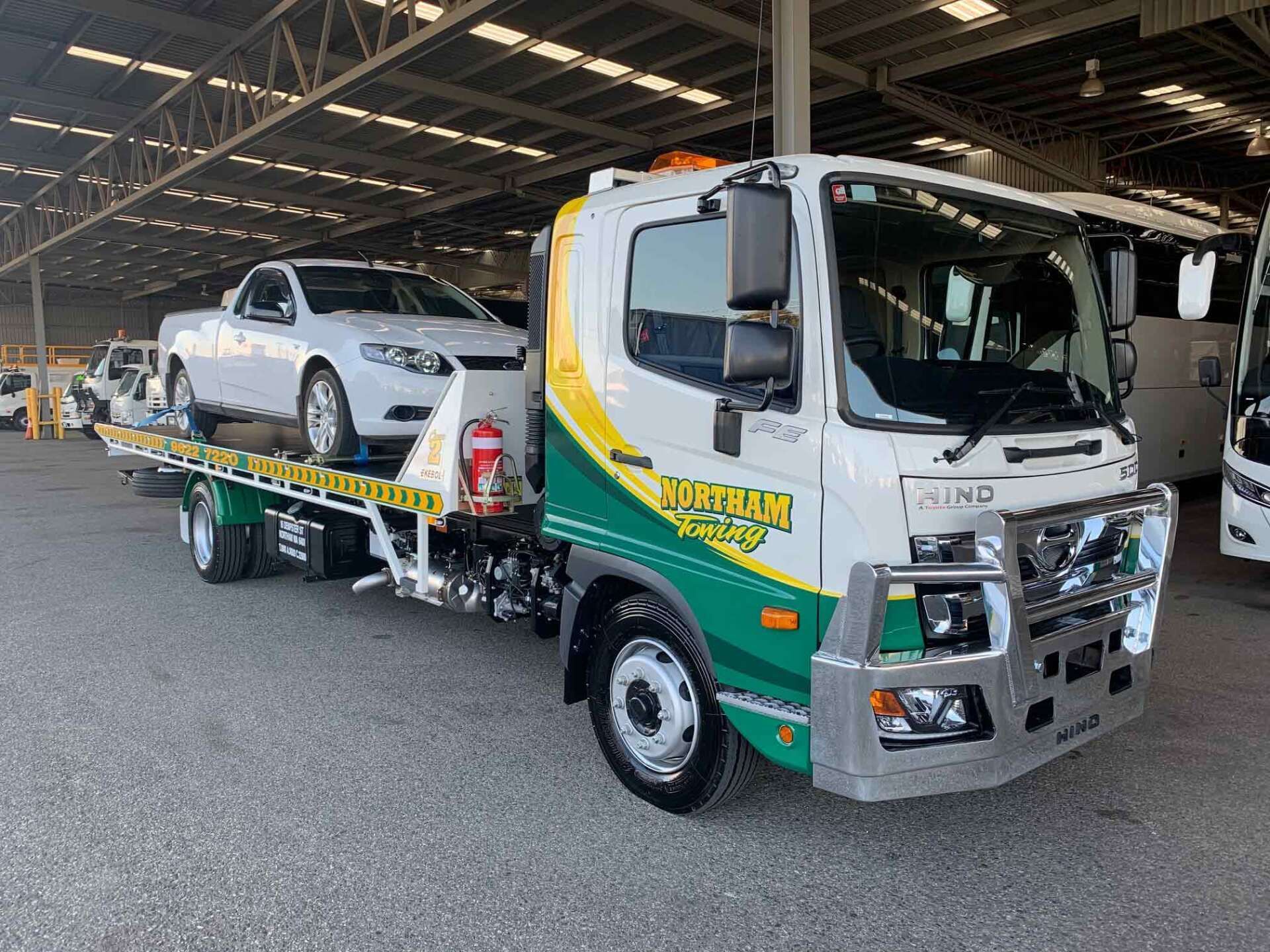 A Tow Truck with a White Car on the Back — Northam, WA — Northam Towing