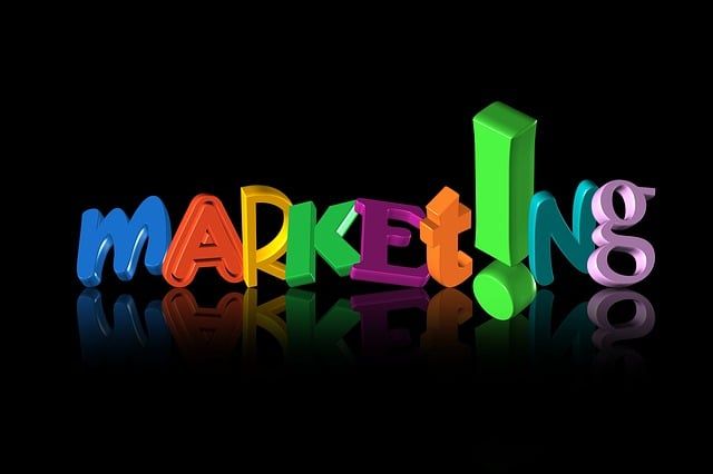 The word marketing is written in colorful letters on a black background