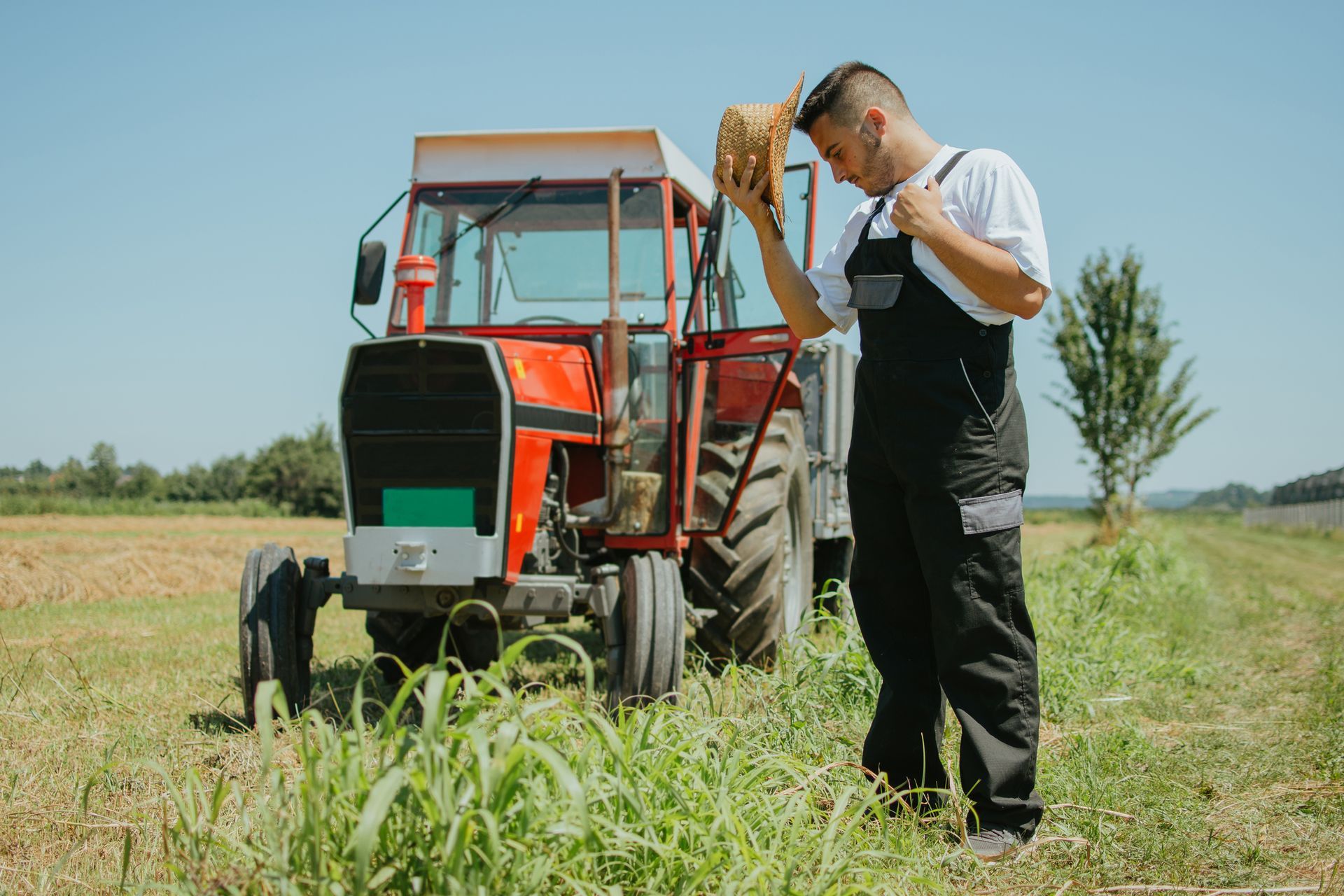 Farmer in front of his tractor