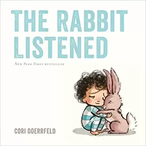 The rabbit listened by cori doerrfeld is a children 's book about a boy hugging a rabbit.