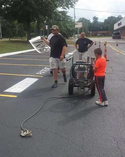 Fixing The Road — Gaston, SC — Huggins Paving & Sealcoating - ABC Sealcoating & Striping