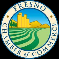 Fresno Chamber of Commerce seal: blue ring with text, landscape of farmland, mountains, buildings, and sky.