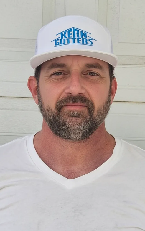 Man wearing a white hat with 