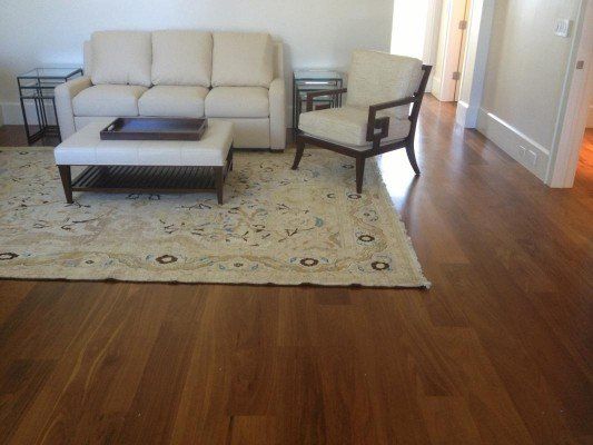 Domestic Tile — Living Room Design With Wooden Foor in Naples, FL