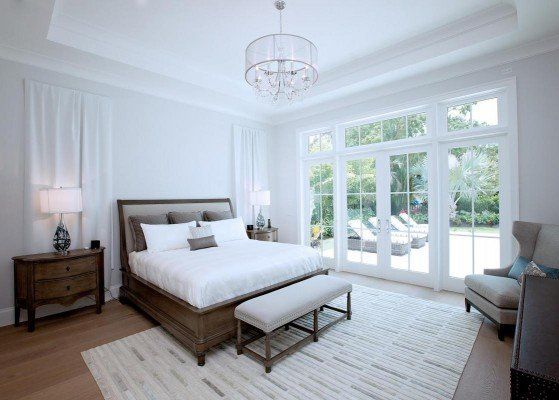 Parquet Flooring — Modern Style Bed Room With Hardwood Flooring And Quality Carpet in Naples, FL