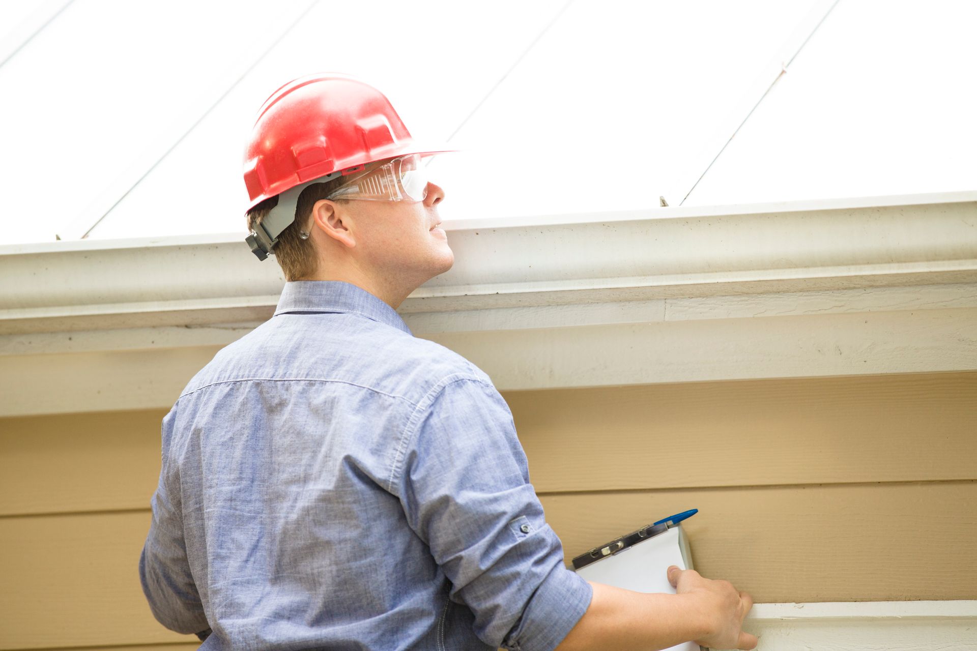 A Man Wearing a Safety Hat | Columbus, GA | Danny Renfroe's Roofing A Man Wearing a Safety Hat | Columbus, GA | Danny Renfroe's Roofing