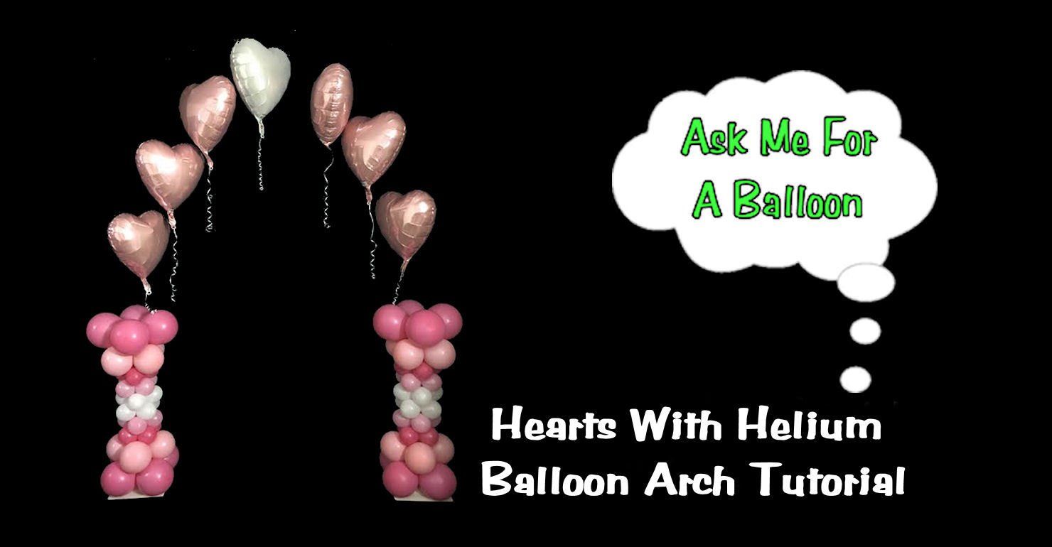 Balloon arch with air filled balloons and helium filled heart foil/mylars.