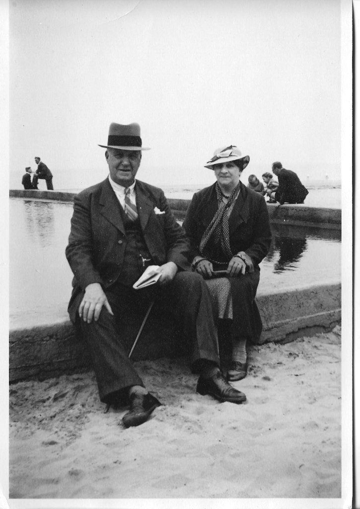 Greyscale image of two men sat down