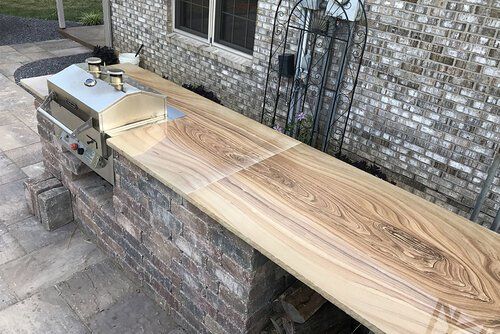 Wood at the top of bricks — Jasper, IA — Dubois Co. Block & Brick Inc.