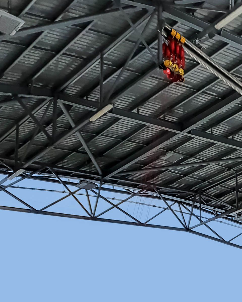 Overhead Rail System For Fall Arrest Attached to the Airplane Hangar Roof 