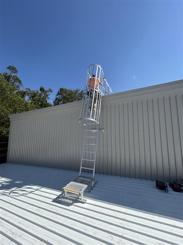 Hierarchy of control measures for working at height - caged ladder installed on the roof
