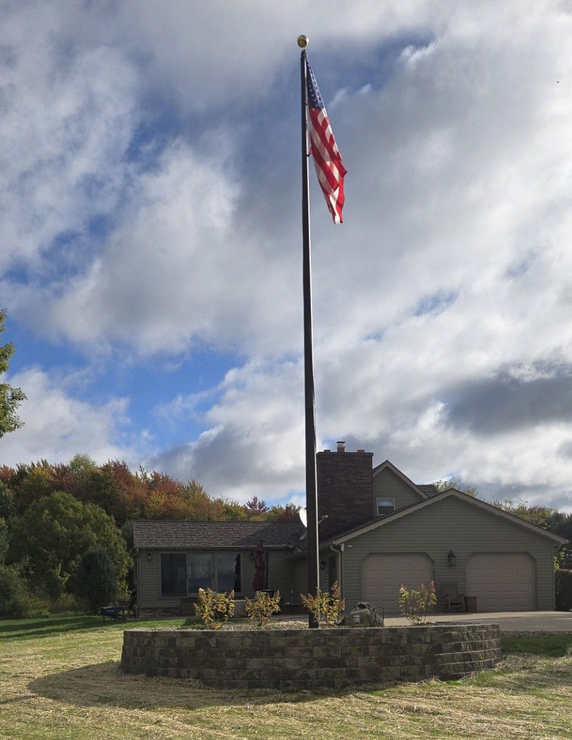 Close up of green lawn on a sunny day. Blue sky on the background.