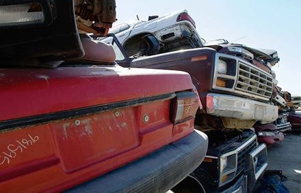 Stacked cars in junkyard — Junk cars in Phoenix, AZ