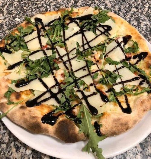 pizza parmigiano e rucola