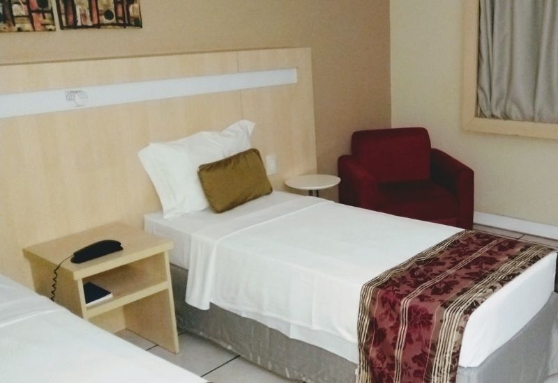 cama de solteiro do quarto luxo duplo