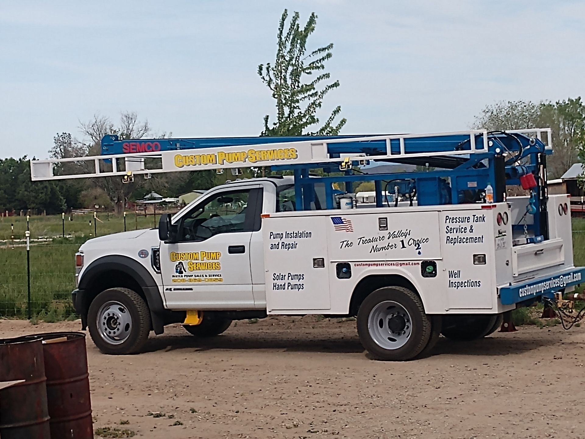 Blue industrial pump with red piping in a factory setting. Blue industrial pump with red piping in a factory setting.