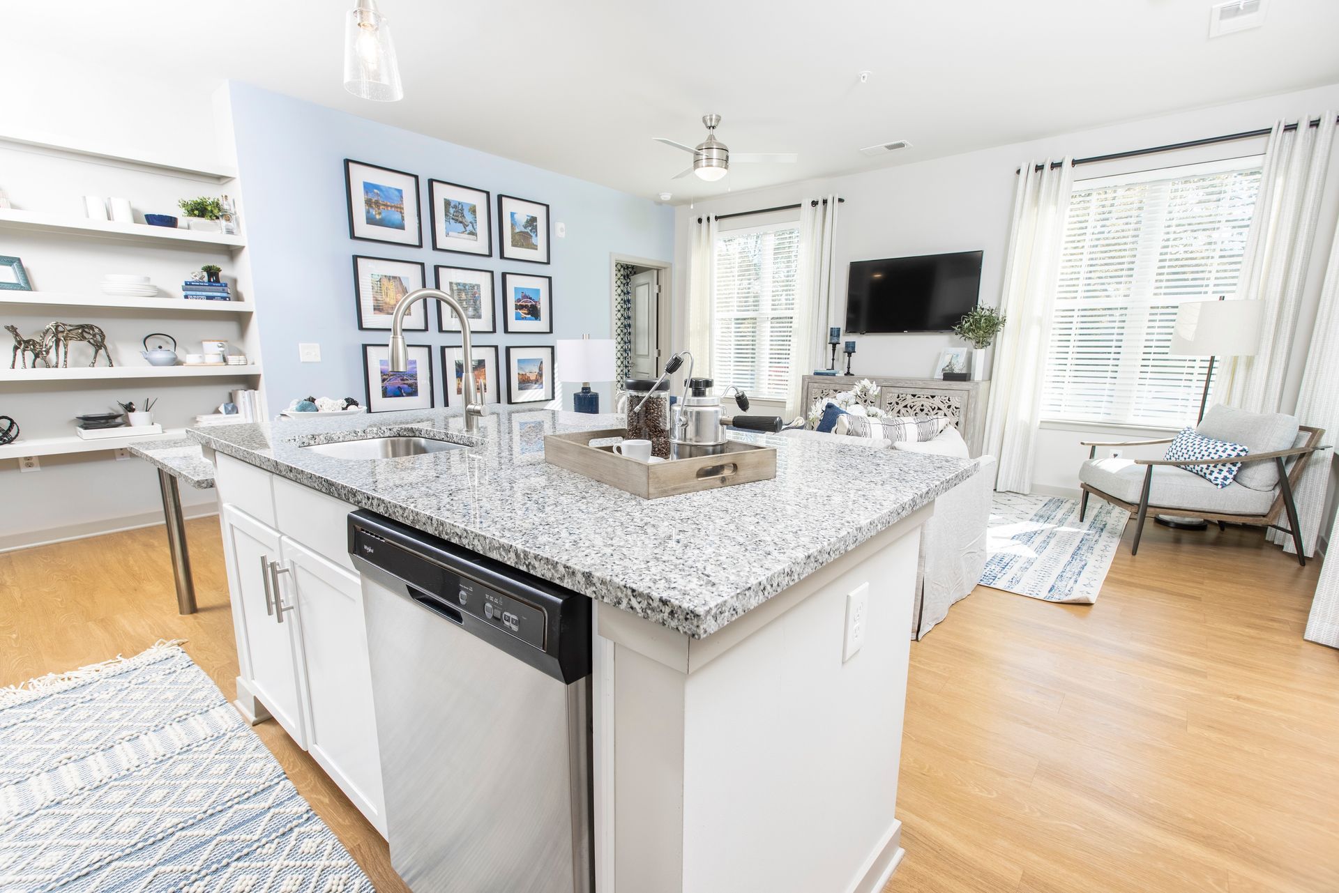 There is a large island in the middle of the kitchen.