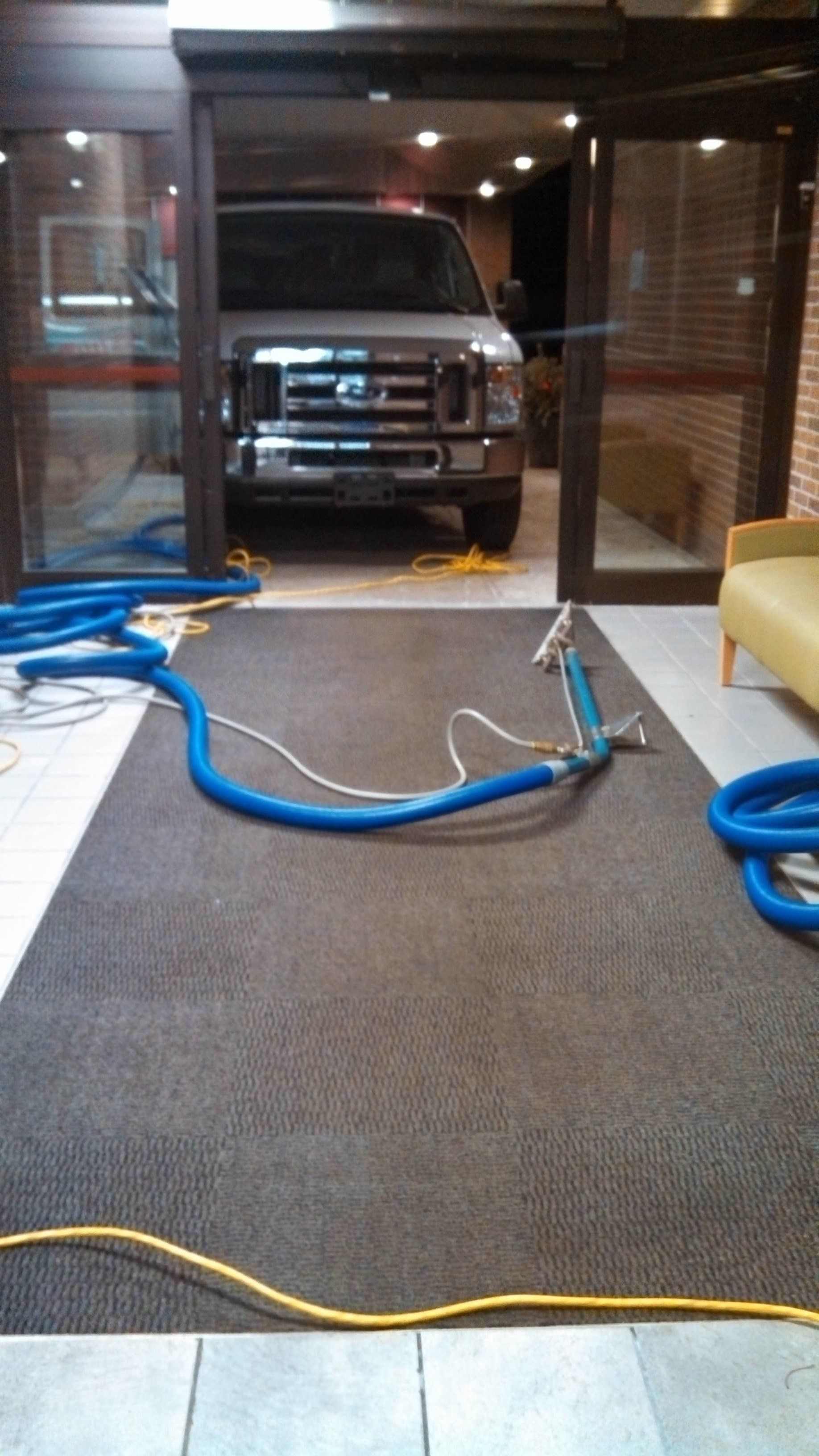 Man Moving The Chair — St. John’s, MI — Clover Carpet Cleaning