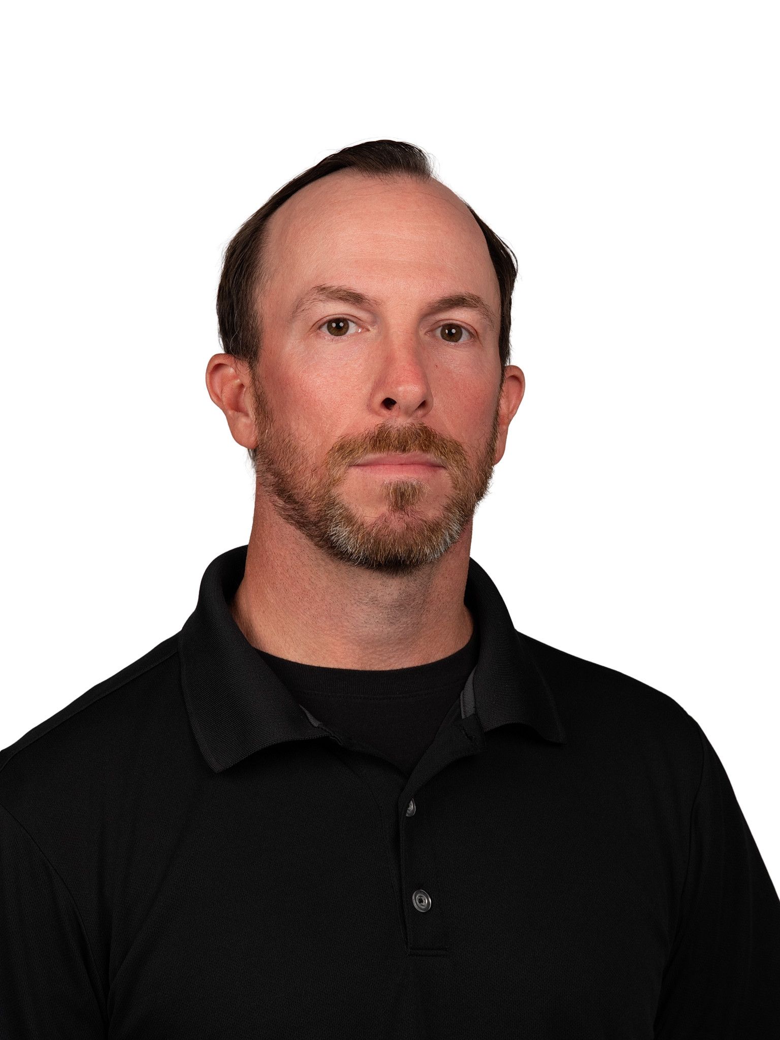 A headshot of someone called Petrut Bambanac. He is standing against a purple wall