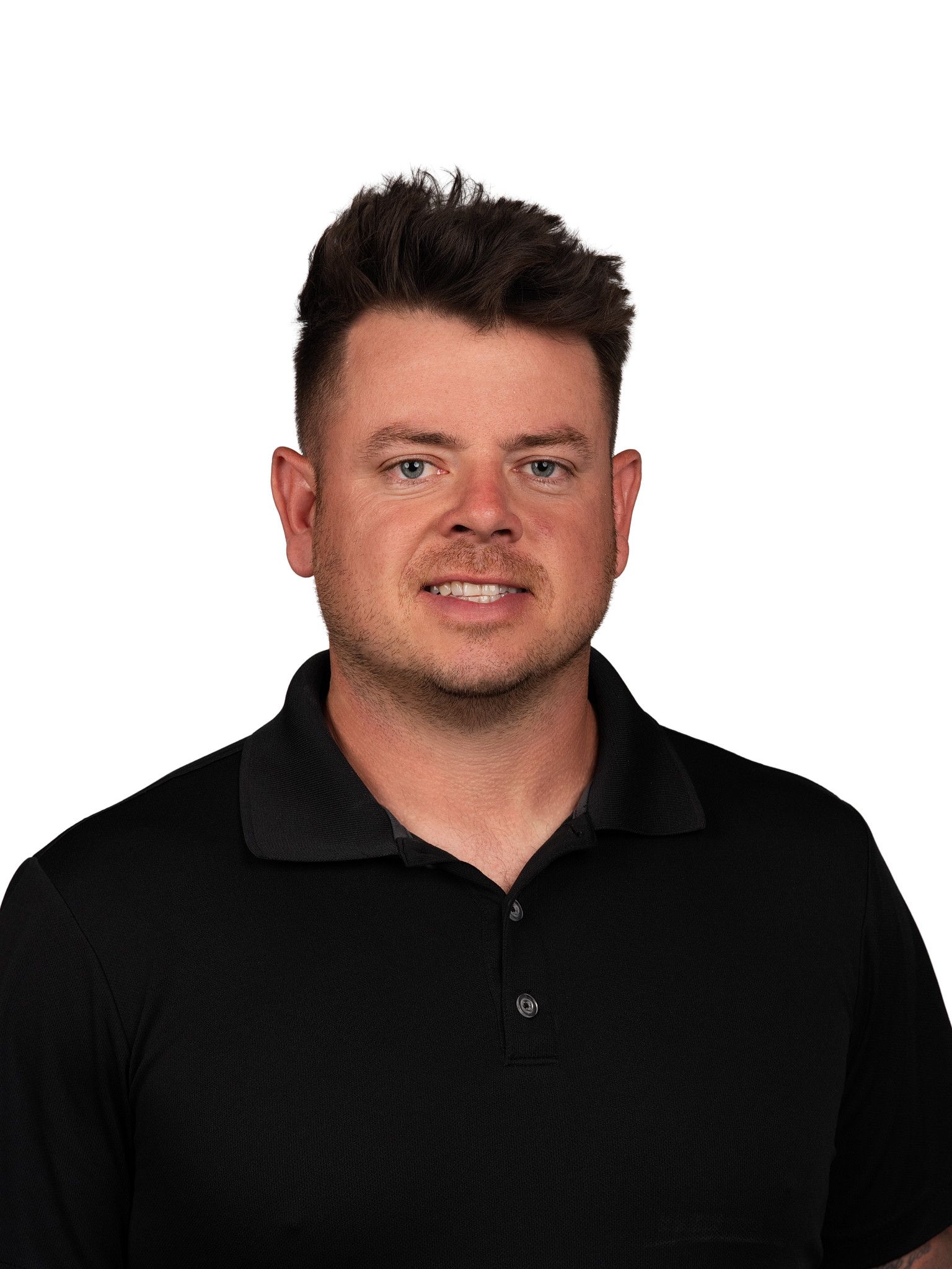 A headshot of someone called Petrut Bambanac. He is standing against a purple wall