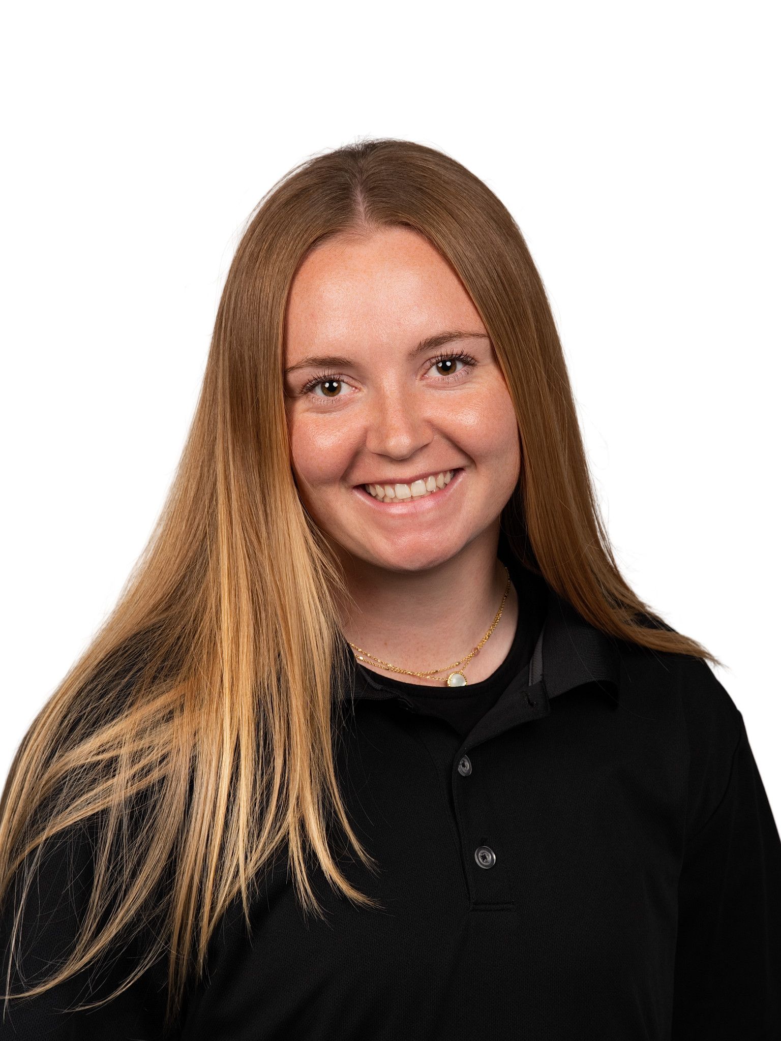 A headshot of someone called Robbie Gobble. He is standing against a purple wall