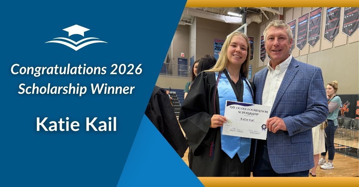 2026 scholarship winner Katie Kail with presenter holding certificate in a gymnasium